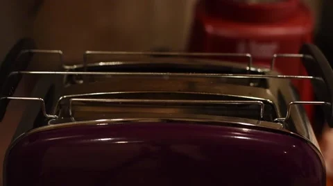 Sliced Bread Toasting in Electric Toaster Stock Footage 60033146