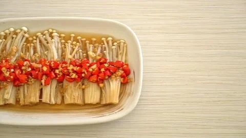 Sliced bread with tomato and herbs on a plate Stock Photos