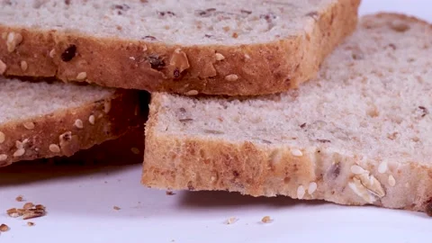Sliced ​​bread on a white background Stock Footage 240011167