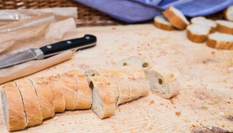 Sliced bread on wood texture Stock Photos