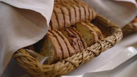 Sliced bread in woven basket with linen cloth Stock Footage 341167769