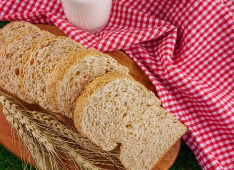 Sliced breads and milk flat lay Stock Photos