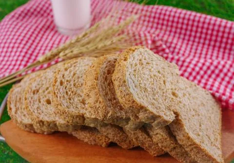Sliced breads and milk flat lay Stock Photos