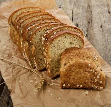 Sliced brown wholewheat bread Stock Photos