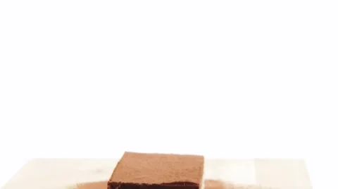 Sliced caramel nut cake Stock Footage 8571192