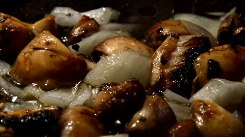 Sliced champignons with onion Stock Footage 321360617