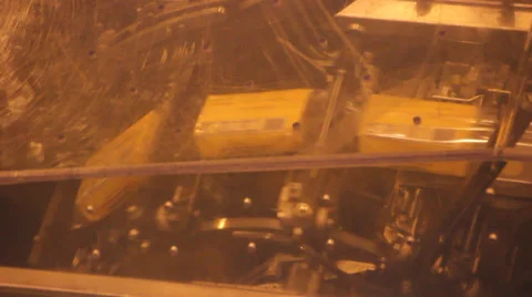 Sliced Cheddar cheese being packaged Video stock 39173011