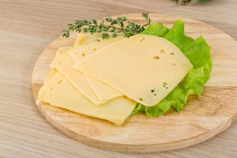 Sliced cheddar Stock Photos