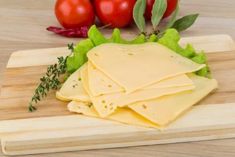 Sliced cheddar Stock Photos