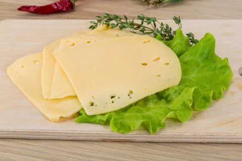 Sliced cheddar Stock Photos