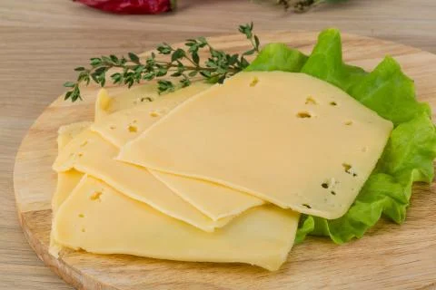 Sliced cheddar Stock Photos