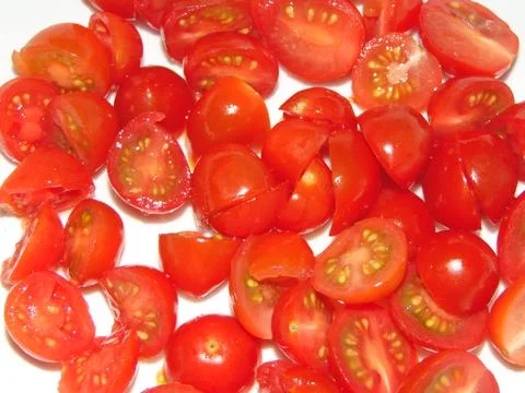 Sliced cherry tomatoes. Group of cherry tomatoes 写真素材