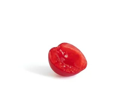 Sliced cherry on a white background. Cherry isolated close up. Stock Photos
