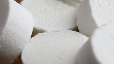 Sliced Chevre goat soft cheese. Macro shot Vidéo 256711161