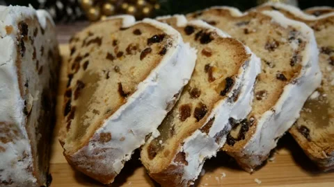 Sliced Christmas stollen on the table Stock Footage 167581514