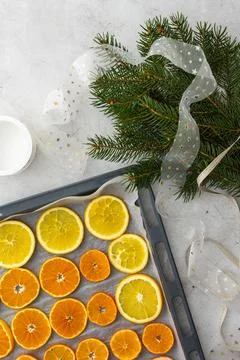 Sliced citrus on baking sheet Stock Photos
