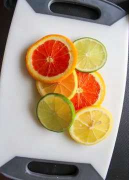 Sliced citrus fruit Stock Photos