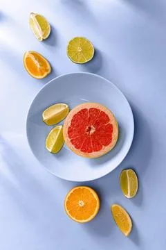 Sliced citrus with grapefruit, lemon and orange Стоковые фото