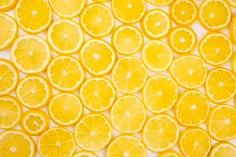 Sliced citrus lemons half on a light background Stock Photos