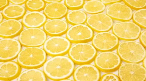 Sliced citrus lemons half on a light background Stock Photos