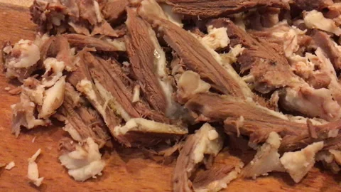 Sliced ?cooked meat in near plan Stock Footage 235016756