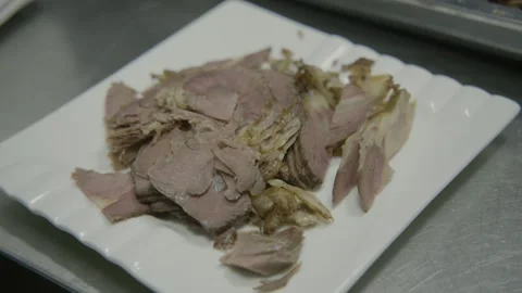 Sliced Cooked Meat on Plate in Beijing Kitchen Preparation Area, Close Up Stock Footage 345855914