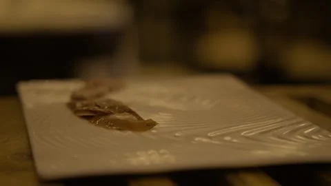 Sliced Cooked Meat on White Plate in Beijing Restaurant Close-Up Stock Footage 345785835