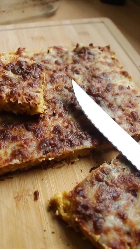 Sliced corn cake on a bamboo cutting board. Stock Footage 304005965
