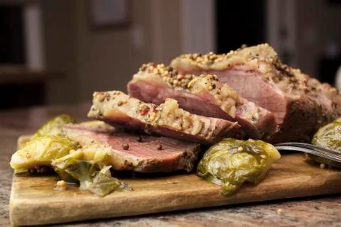 Sliced Corned Beef On A Cutting Board Stock Photos