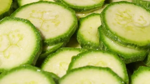 Sliced courgettes zucchini Video stock 141805362