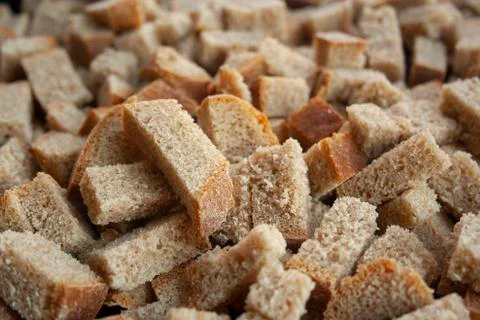 Sliced in cubes dark bread pieces crackers Stock Photos
