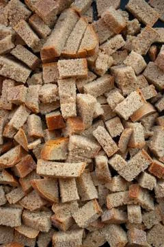 Sliced in cubes dark bread pieces crackers Stock Photos