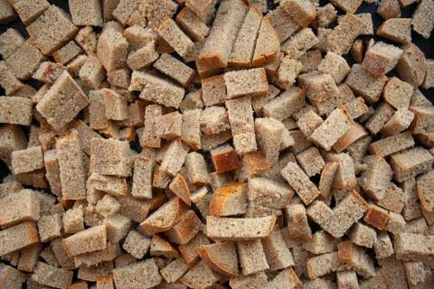 Sliced in cubes dark bread pieces crackers Stock Photos