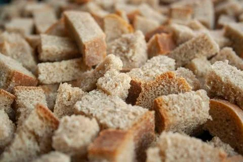 Sliced in cubes dark bread pieces crackers Stock Photos
