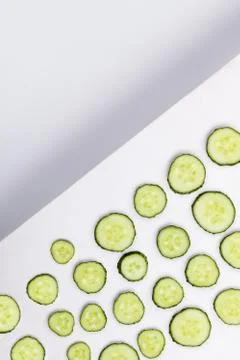 Sliced cucumber creative background Stock Photos
