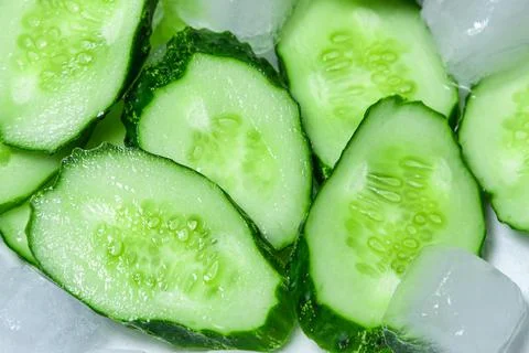 Sliced cucumber with ice. Stock Photos