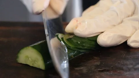Sliced Cucumber with the knife. Stock Footage 124681920