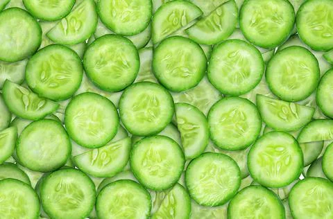 Sliced cucumber slices background Stock Photos