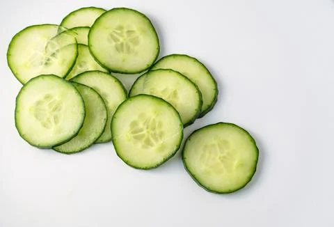 Sliced cucumber on white background Stock Photos