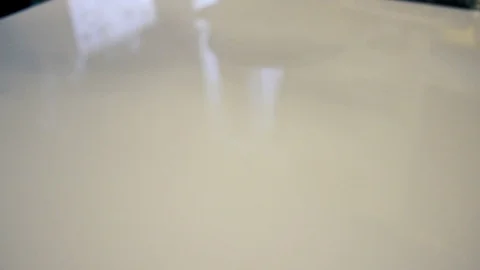 Sliced cucumbers falling down on white glass. Cucumbers sliced in long pieces. Stock Footage 125208906