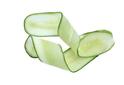 Sliced cucumbers isolated on white background with clipping path. Stock Photos