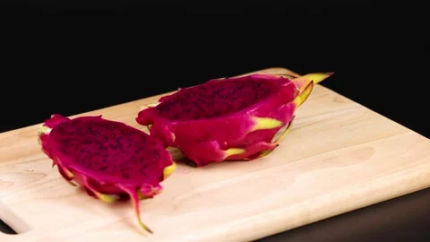 Sliced Dragon Fruit on Cutting Board Stock Footage 306269583