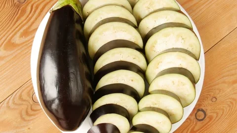 Sliced eggplant on a plate. Stock Footage 246730170