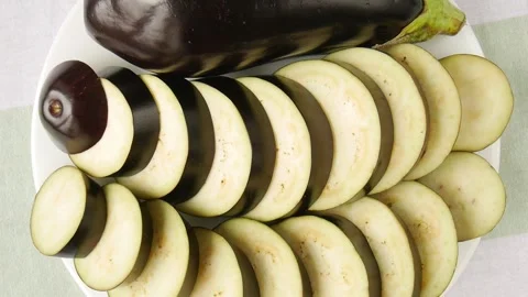 Sliced eggplant on a plate. Stock Footage 247816131