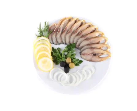 Sliced fish on plate Stock Photos