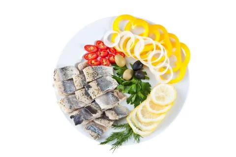 Sliced fish with vegetables Stock Photos