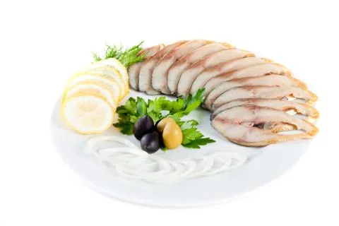 Sliced fish with vegetables Stock Photos