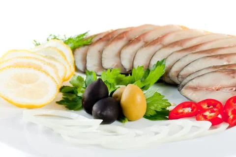 Sliced fish with vegetables Stock Photos