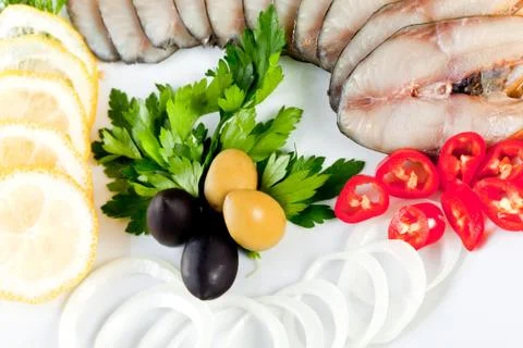 Sliced fish with vegetables Stock Photos