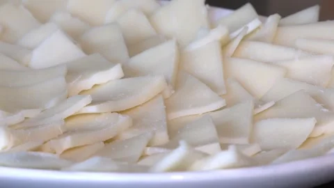 Sliced fresh cheese, close-up. Video stock 263581306